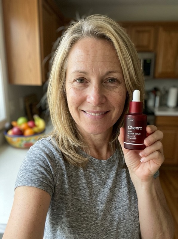 Osenra customer holding the CPAP Peptide Serum