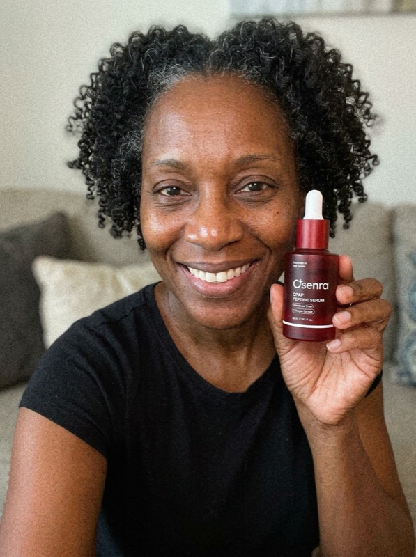 Osenra customer holding the CPAP Peptide Serum