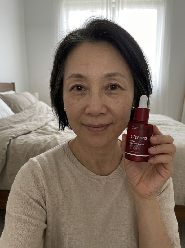 Osenra customer holding the CPAP Peptide Serum